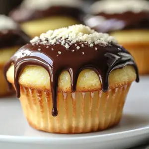 Boston Cream Cupcake Delights with chocolate ganache and vanilla custard filling